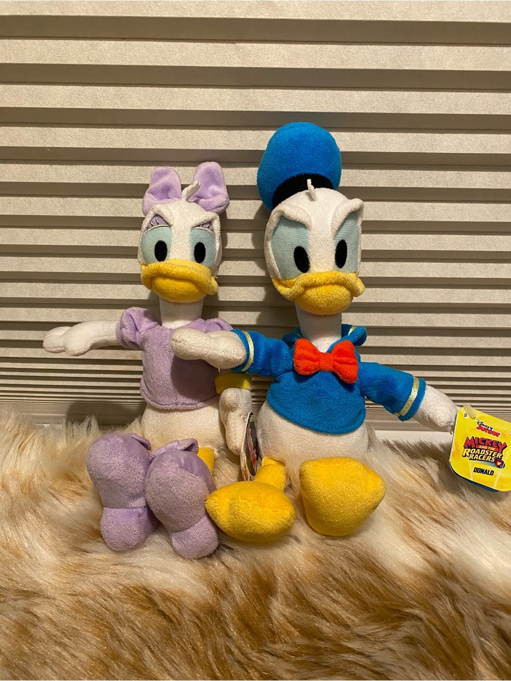 Disney Daisy and Donald Duck plush toys
